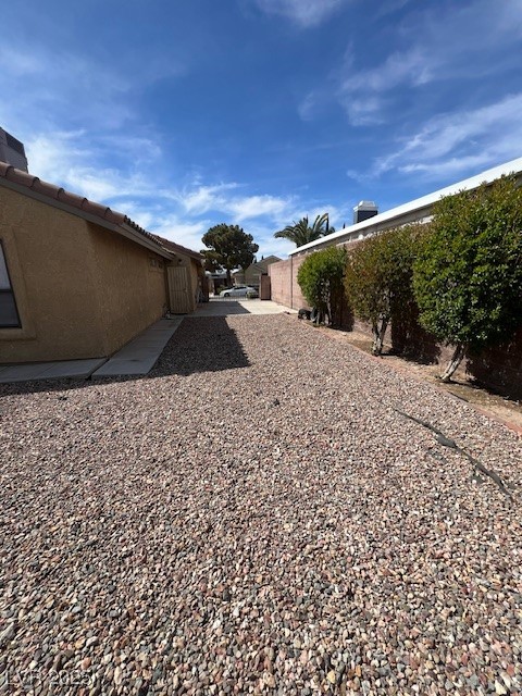 1117 Grillo Way Boulder City, NV 89005 - Photo 18 of 19 View of back side RV parking