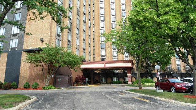1 Renaissance Place, Unit 915 Palatine, IL 60067 - Photo 1 of 11 a front view of a building with garden