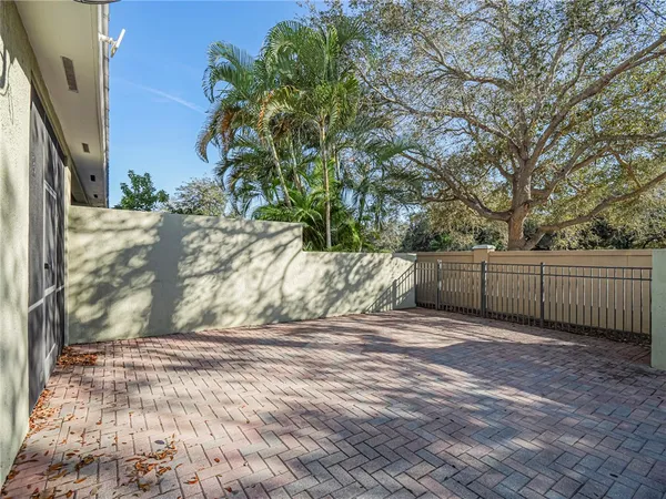 a view of a backyard of the house