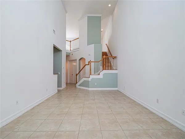 an entryway in a hall with a workspace