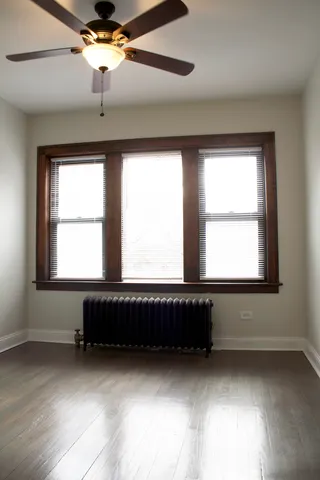 a view of a room with windows