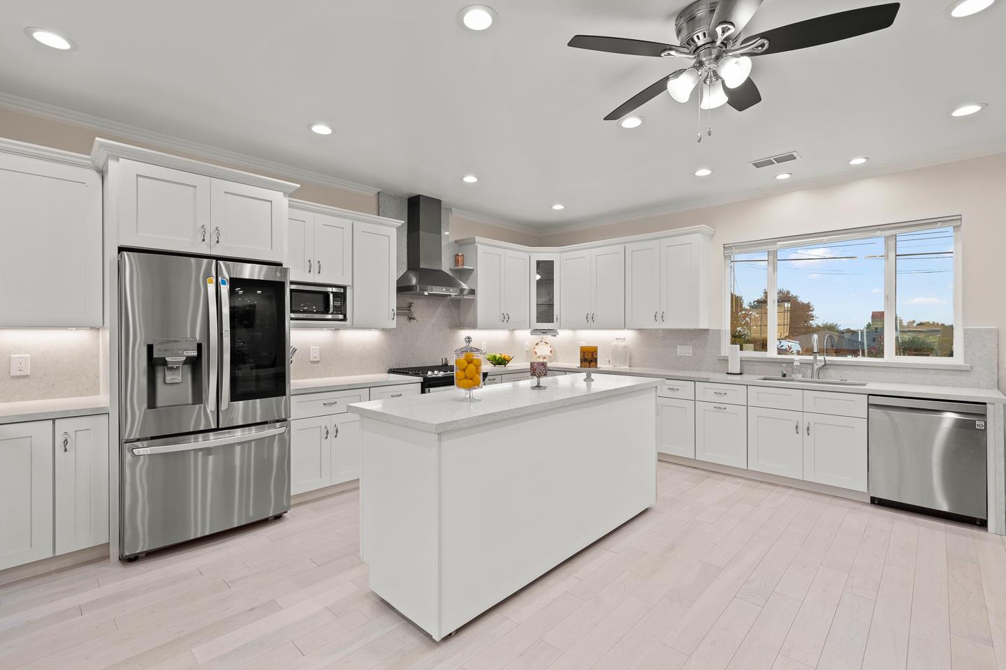 1011 Prospect Heights Santa Cruz, CA 95065 - Photo 15 of 50 a kitchen with stainless steel appliances a refrigerator sink and microwave