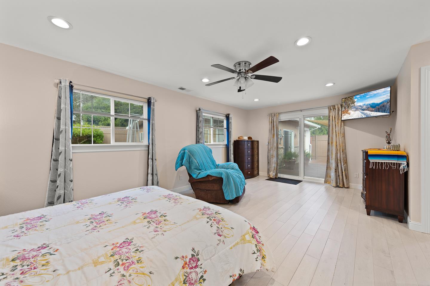 1011 Prospect Heights Santa Cruz, CA 95065 - Photo 31 of 50 a bedroom with a large bed and a chandelier