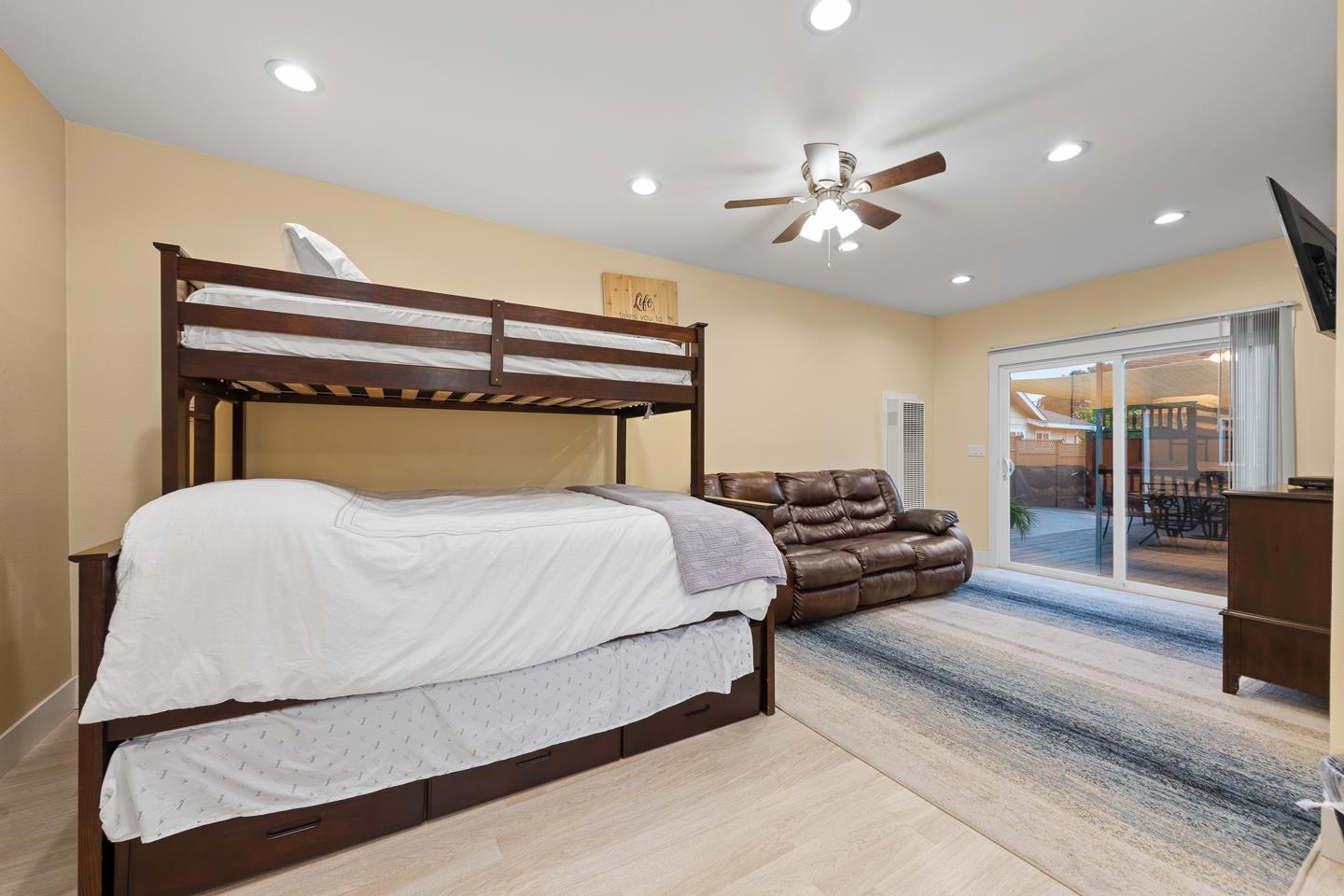 1011 Prospect Heights Santa Cruz, CA 95065 - Photo 37 of 50 a bedroom with a bed and glass walk in closet