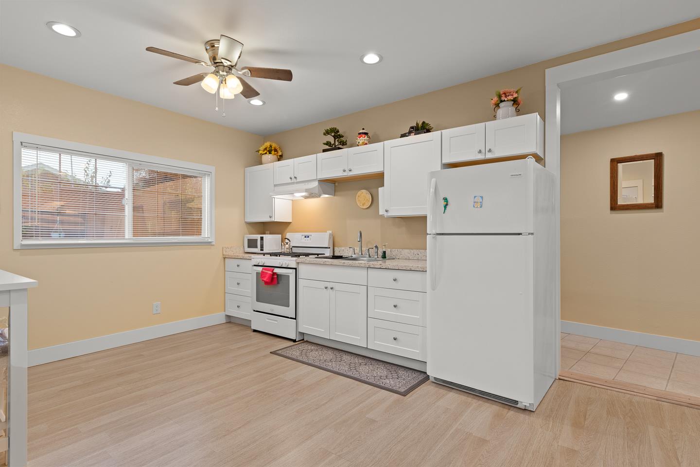 1011 Prospect Heights Santa Cruz, CA 95065 - Photo 38 of 50 a storage room with cabinets and wooden floor