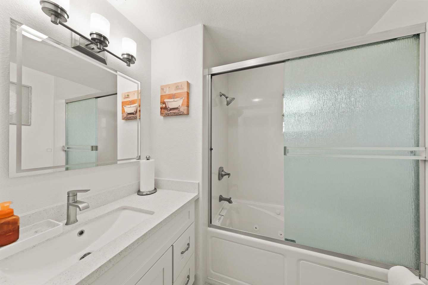 1011 Prospect Heights Santa Cruz, CA 95065 - Photo 48 of 50 a bathroom with a shower sink vanity and mirror