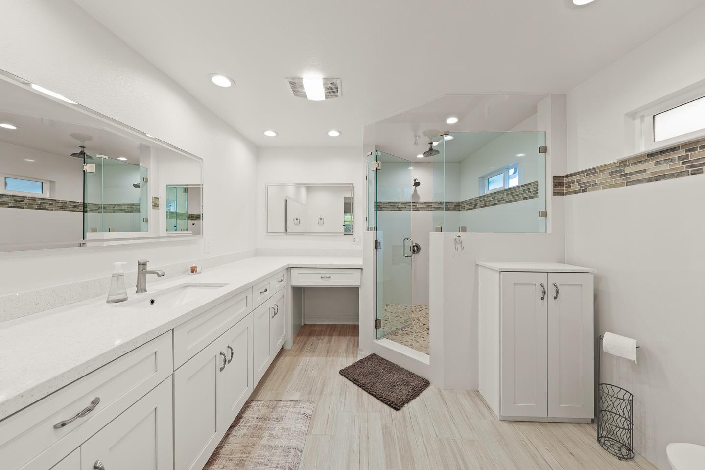 1011 Prospect Heights Santa Cruz, CA 95065 - Photo 49 of 50 a large bathroom with a double vanity sink a large mirror and shower