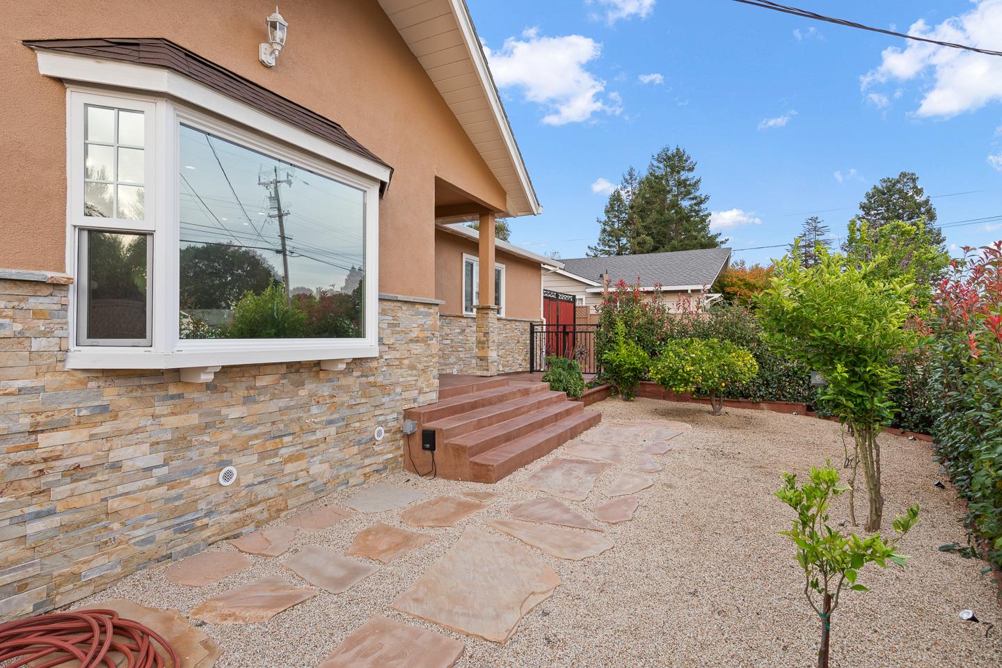 1011 Prospect Heights Santa Cruz, CA 95065 - Photo 5 of 50 a front view of a house with a yard