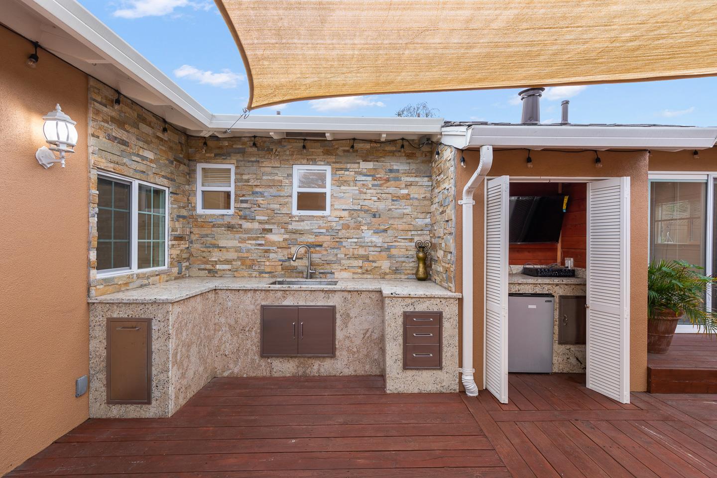 1011 Prospect Heights Santa Cruz, CA 95065 - Photo 7 of 50 a kitchen with stainless steel appliances granite countertop a stove and a refrigerator