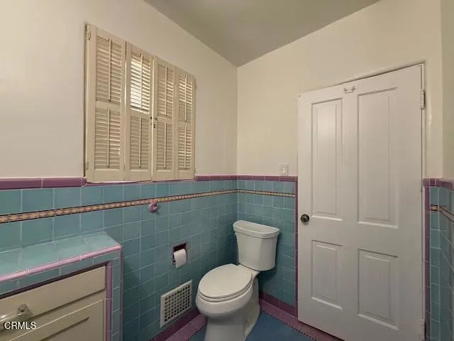 a bathroom with a bathtub and sink