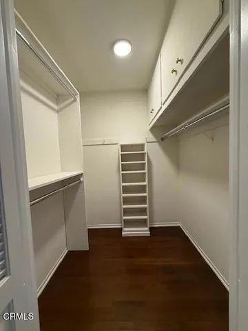 a bathroom with a toilet a sink and shower