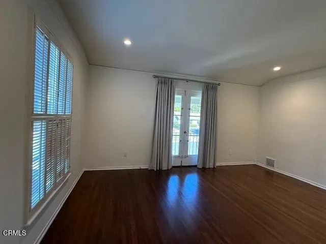 a bathroom with a sink a mirror and a bathtub