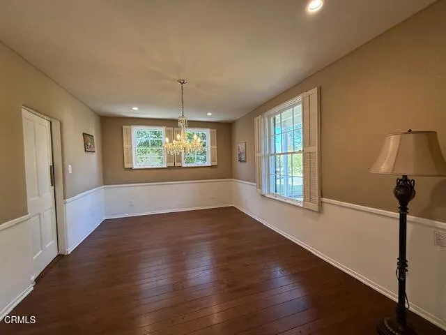 a kitchen with stainless steel appliances granite countertop a stove and a refrigerator