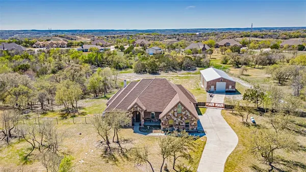 $815,000 | 114 Woodlot Lane, Azle, TX 76020