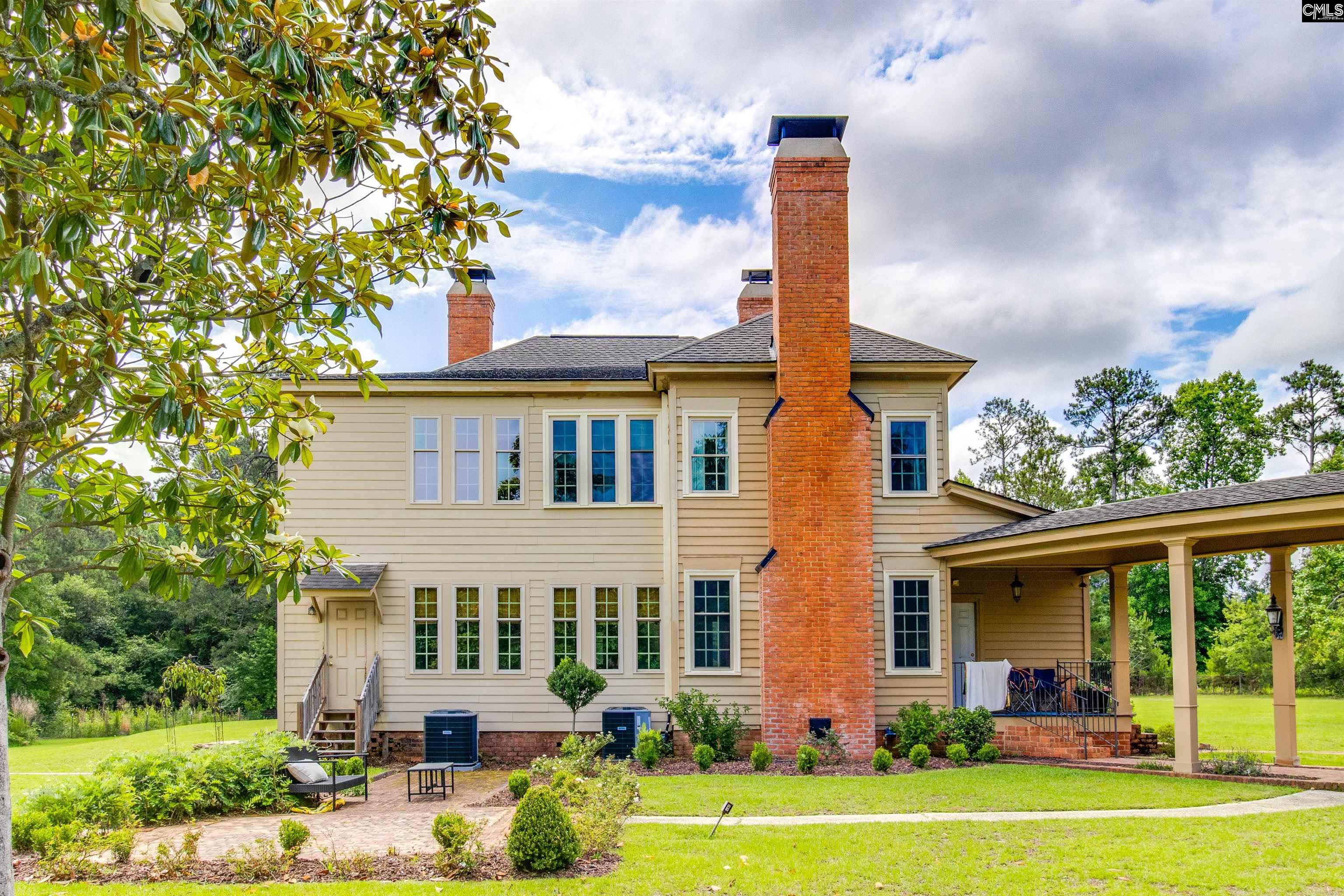 701 Longtown Road Columbia, SC 29229 - Photo 2 of 26 a front view of a house with garden