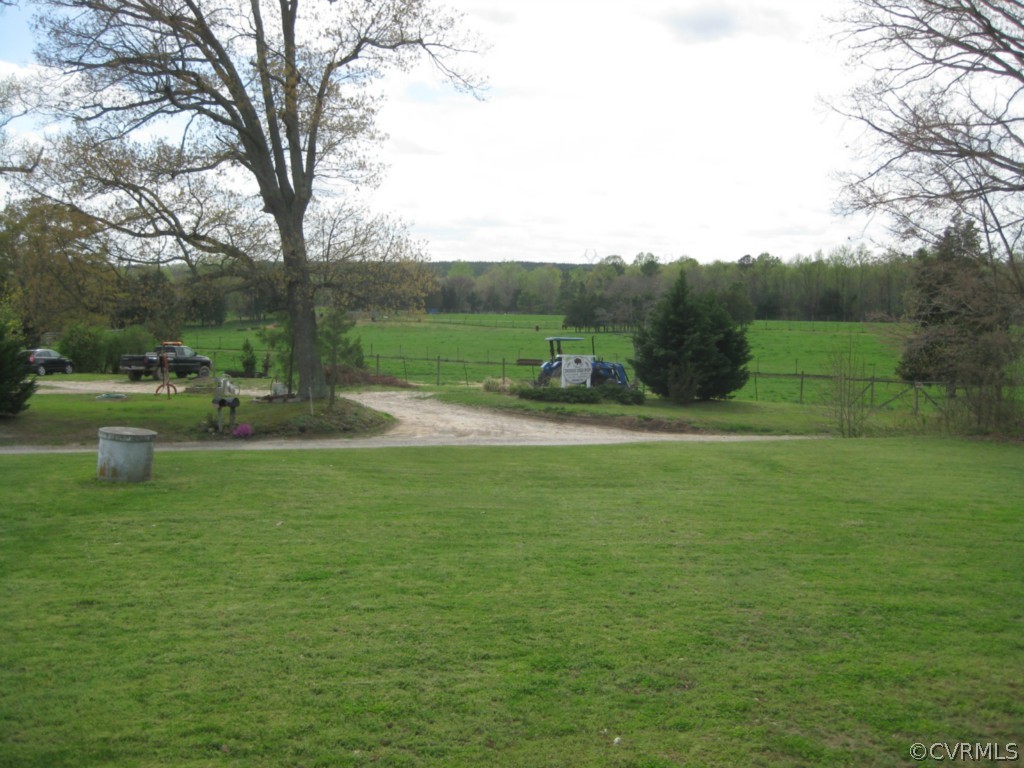 1067 Unity Road Kenbridge, VA 23944 - Photo 11 of 21 a view of outdoor space with garden and trees