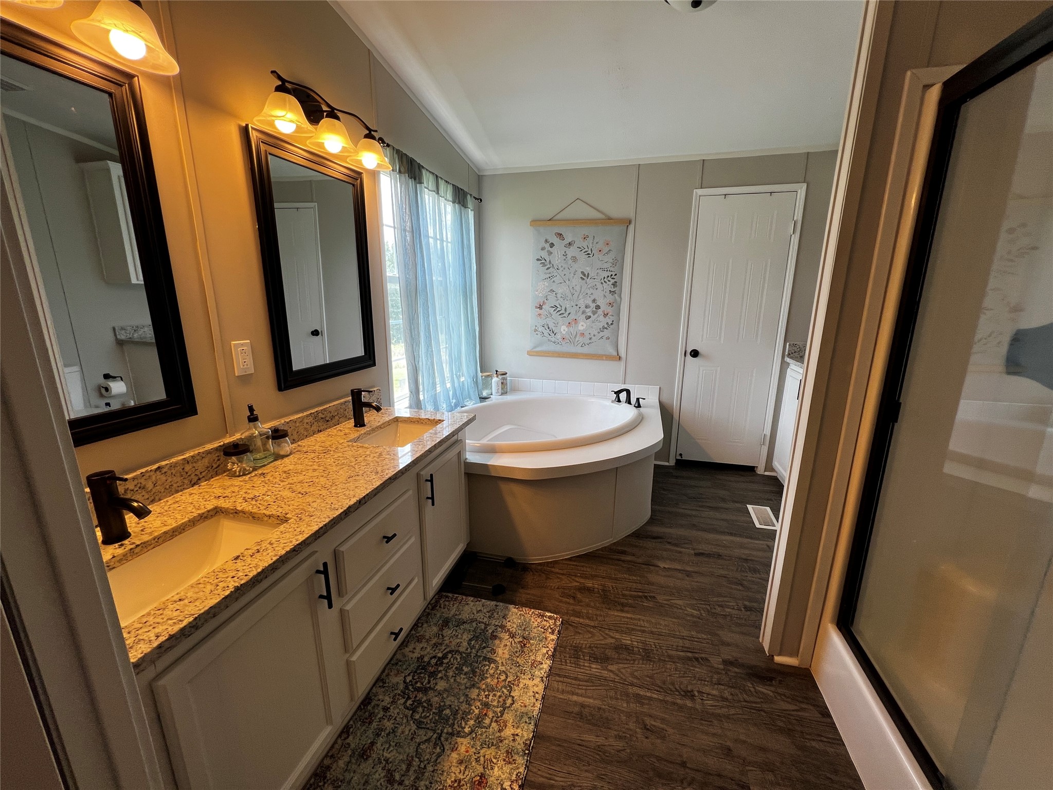 2346 Pr 1105 Midway, TX 75850 - Photo 14 of 25 a bathroom with a double vanity sink mirror and toilet