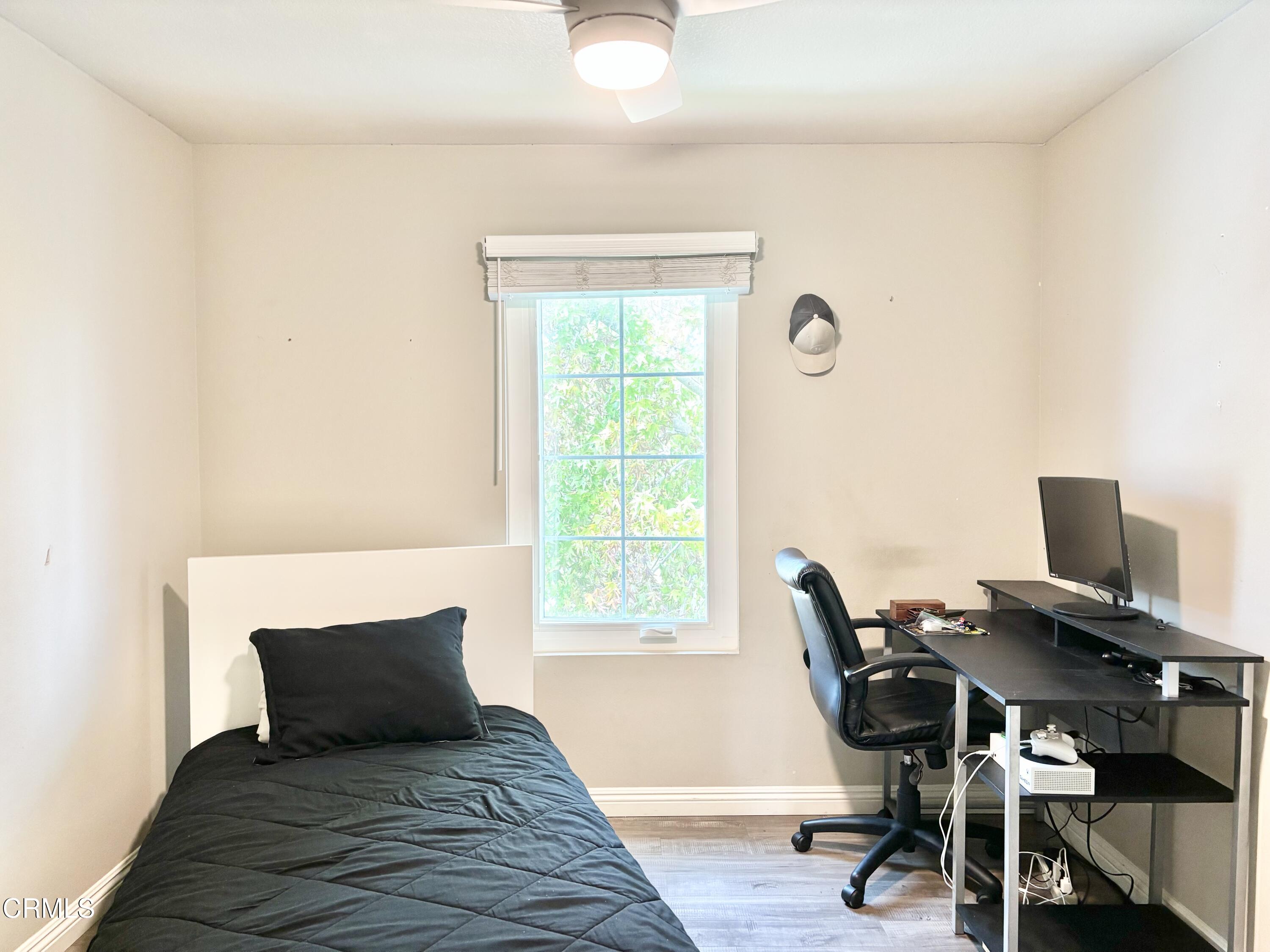 818 Navigator Way Oxnard, CA 93035 - Photo 11 of 29 a bedroom with a bed and a desk