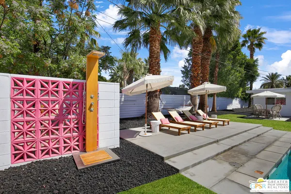a garden view with a sitting space