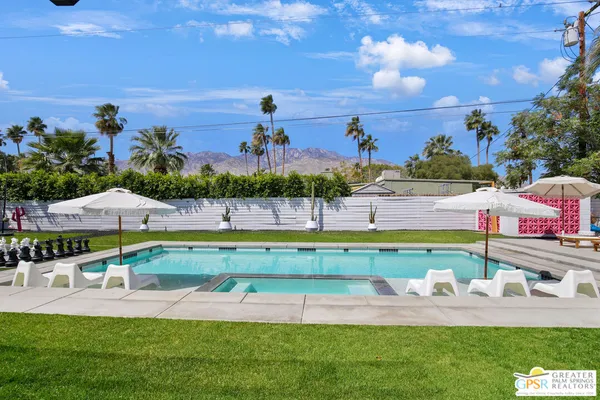 a view of a swimming pool and outdoor space
