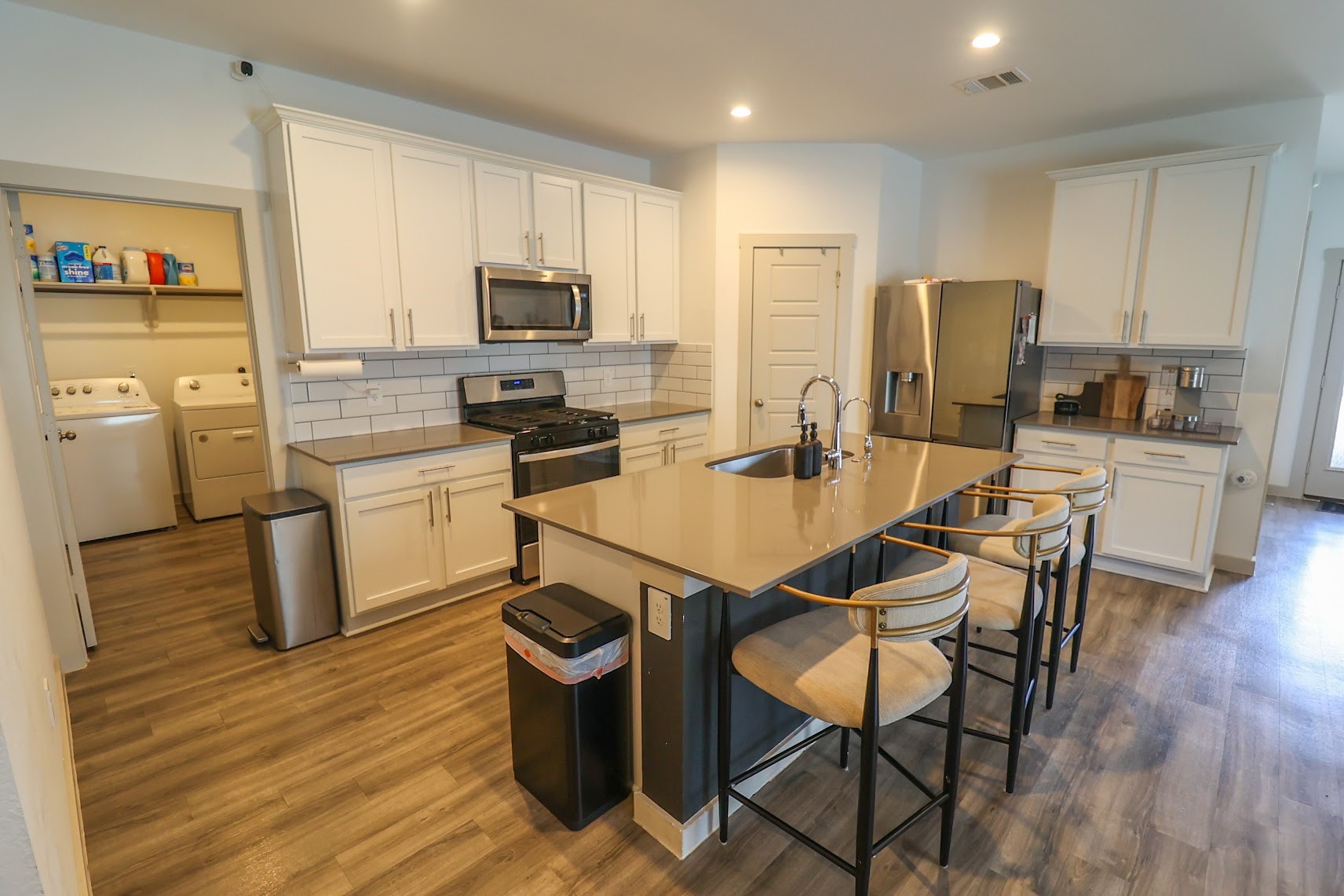 7727 Sleek Flock Lane Rosharon, TX 77583 - Photo 48 of 50 Open floor plan with the kitchen area opening to the family room. W&D conveniently located near kitchen.