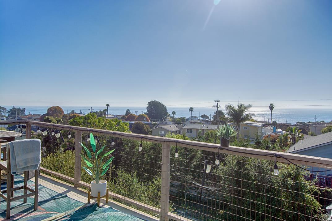 369 Sea Ridge Road Aptos, CA 95003 - Photo 14 of 20 a view of a balcony with wooden floor and outdoor seating