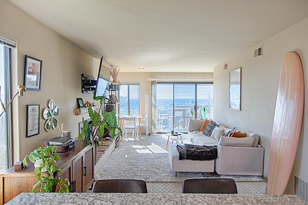 369 Sea Ridge Road Aptos, CA 95003 - Photo 10 of 20 a living room with furniture and a large window