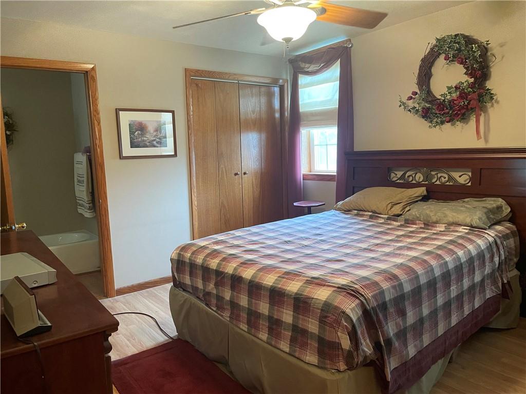 1606 Atkinson Street New Castle, PA 16101 - Photo 15 of 15 a bedroom with a bed and wooden floor
