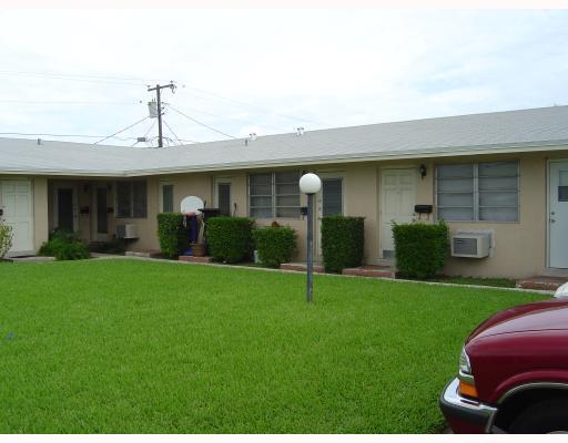 7624 Pembroke Road, Unit C Miramar, FL 33023 - Photo 2 of 13 a view of a yard in front of a house