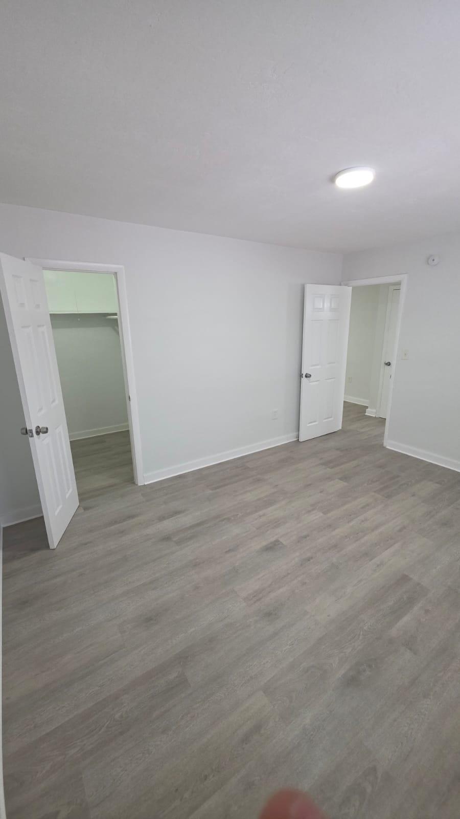 7624 Pembroke Road, Unit C Miramar, FL 33023 - Photo 6 of 13 a view of an empty room and wooden floor