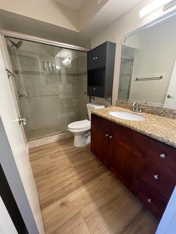 5148 Conroy Road, Unit 18 Orlando, FL 32811 - Photo 13 of 30 a bathroom with a sink and a mirror