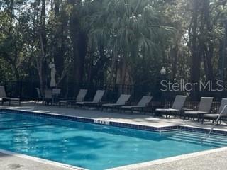 5148 Conroy Road, Unit 18 Orlando, FL 32811 - Photo 27 of 30 a view of a park with large trees