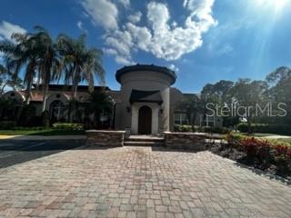 5148 Conroy Road, Unit 18 Orlando, FL 32811 - Photo 29 of 30 a front view of a house with garden