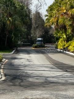 5148 Conroy Road, Unit 18 Orlando, FL 32811 - Photo 30 of 30 a view of swimming pool with a trees