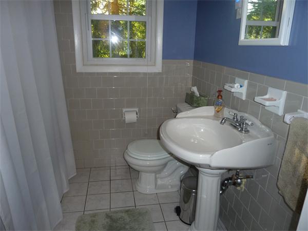 9 Gary Road Chelmsford, MA 01824 - Photo 10 of 14 a bathroom with a toilet sink and window