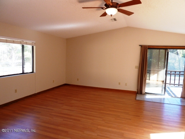 4289 Banks Road Middleburg, FL 32068 - Photo 16 of 25 Lots of Windows & door to Screened Lanai