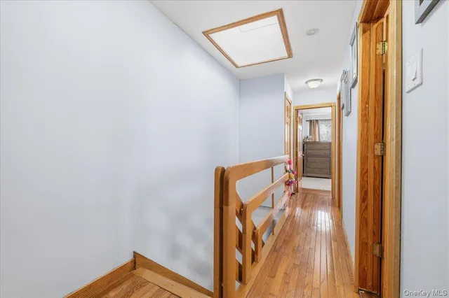 a view of a bathroom with a sink and a mirror