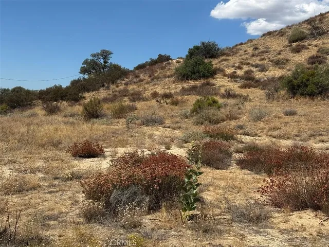 a view of an ocean and a mountain