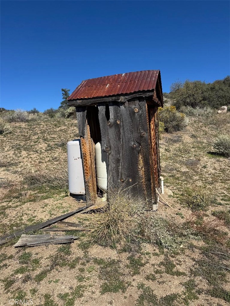 0 Kool Vista Anza, CA 92539 - Photo 37 of 38 a view of a wooden house with a yard