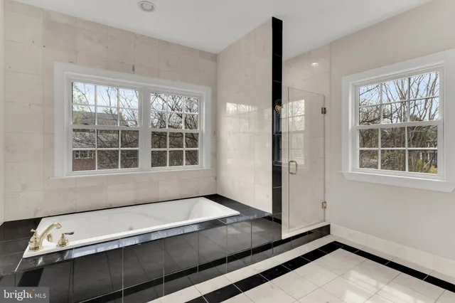 a view of an empty room and wooden floor