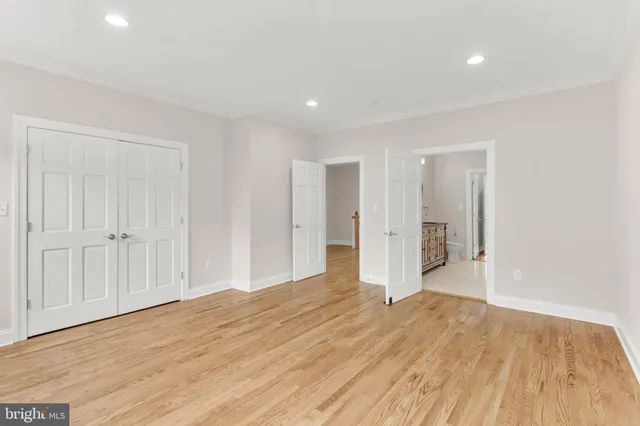 an empty room with a windows