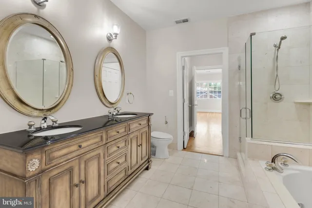 a view of an empty room with a fireplace