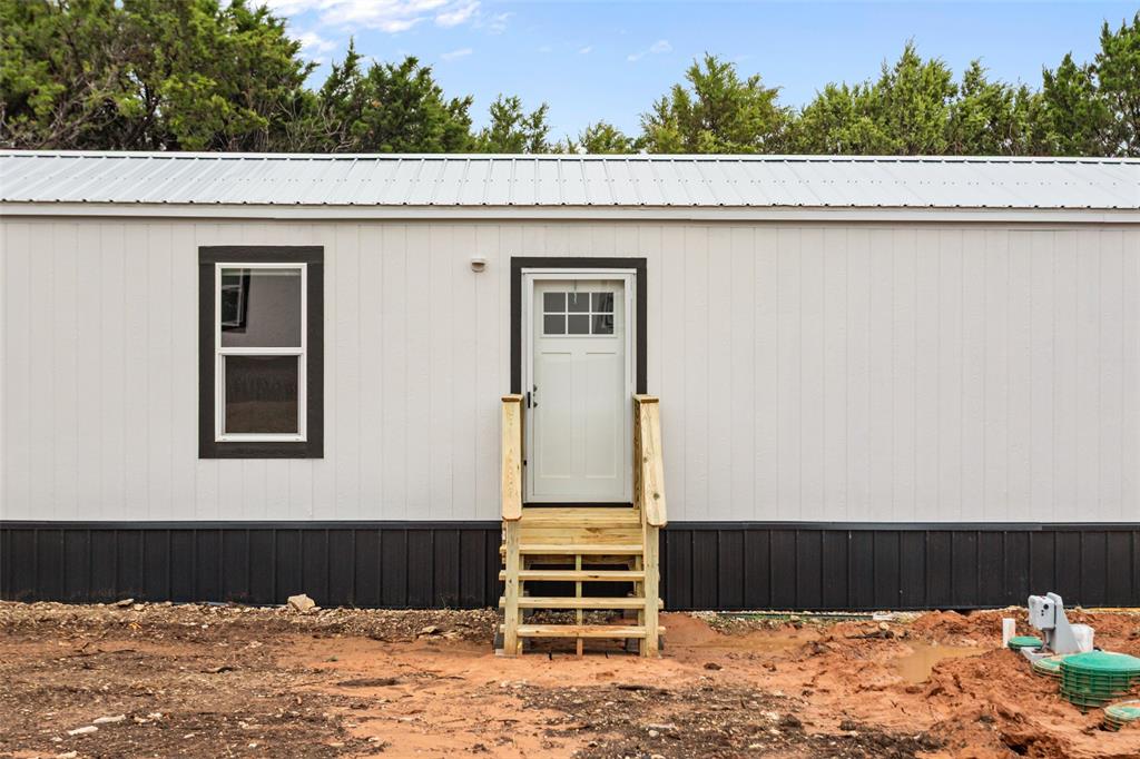 3606 Hilltop Road Granbury, TX 76048 - Photo 2 of 25 a front view of a house