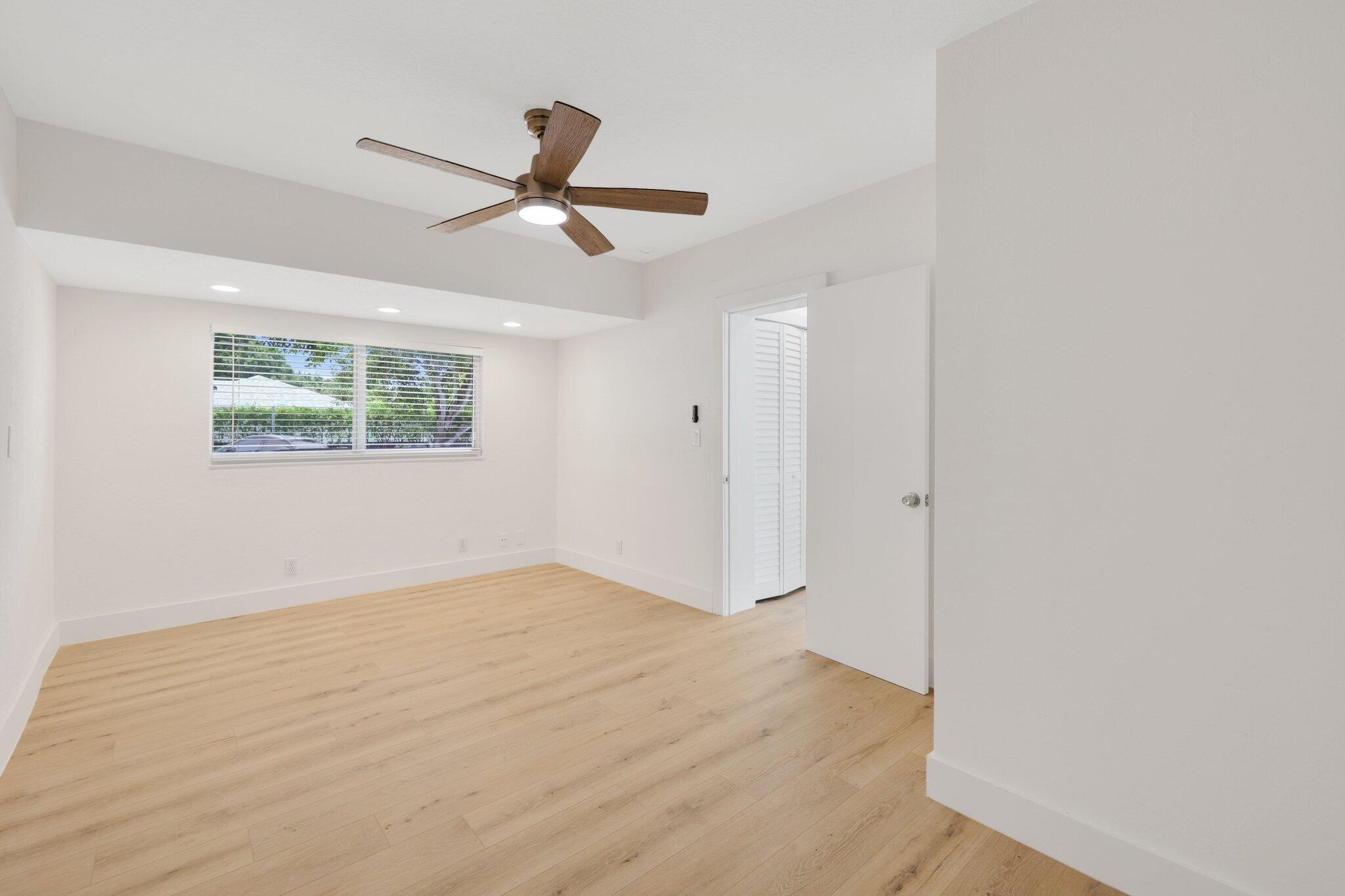1198 Southwest 3rd Street Boca Raton, FL 33486 - Photo 15 of 29 a view of an empty room with a window