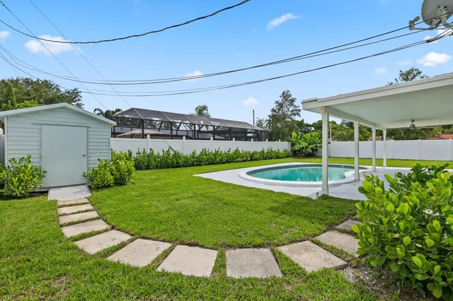 a view of a porch with a yard
