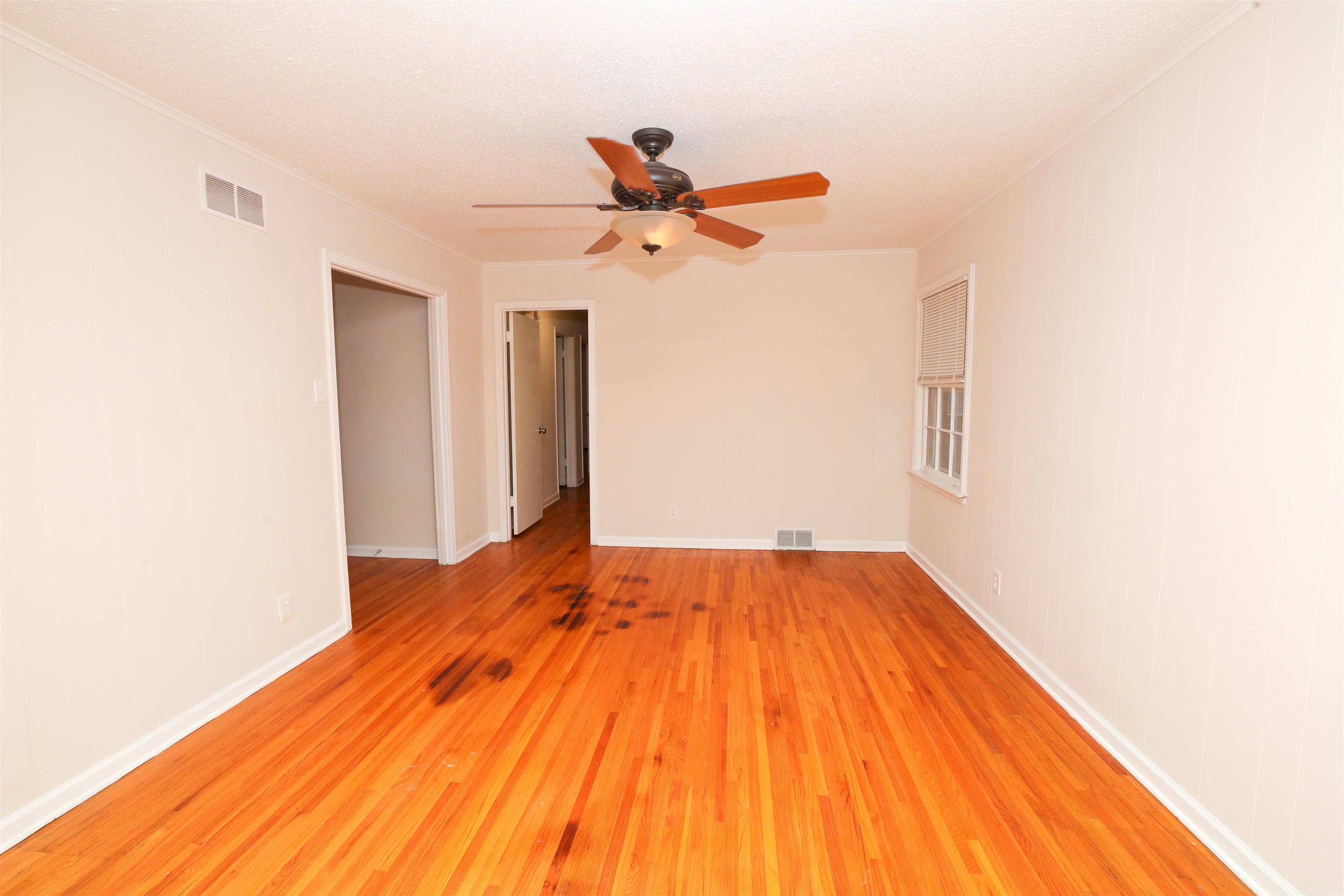 4843 Rolling Fields Drive Memphis, TN 38128 - Photo 8 of 22 Spare room featuring hardwood / wood-style flooring and ceiling fan