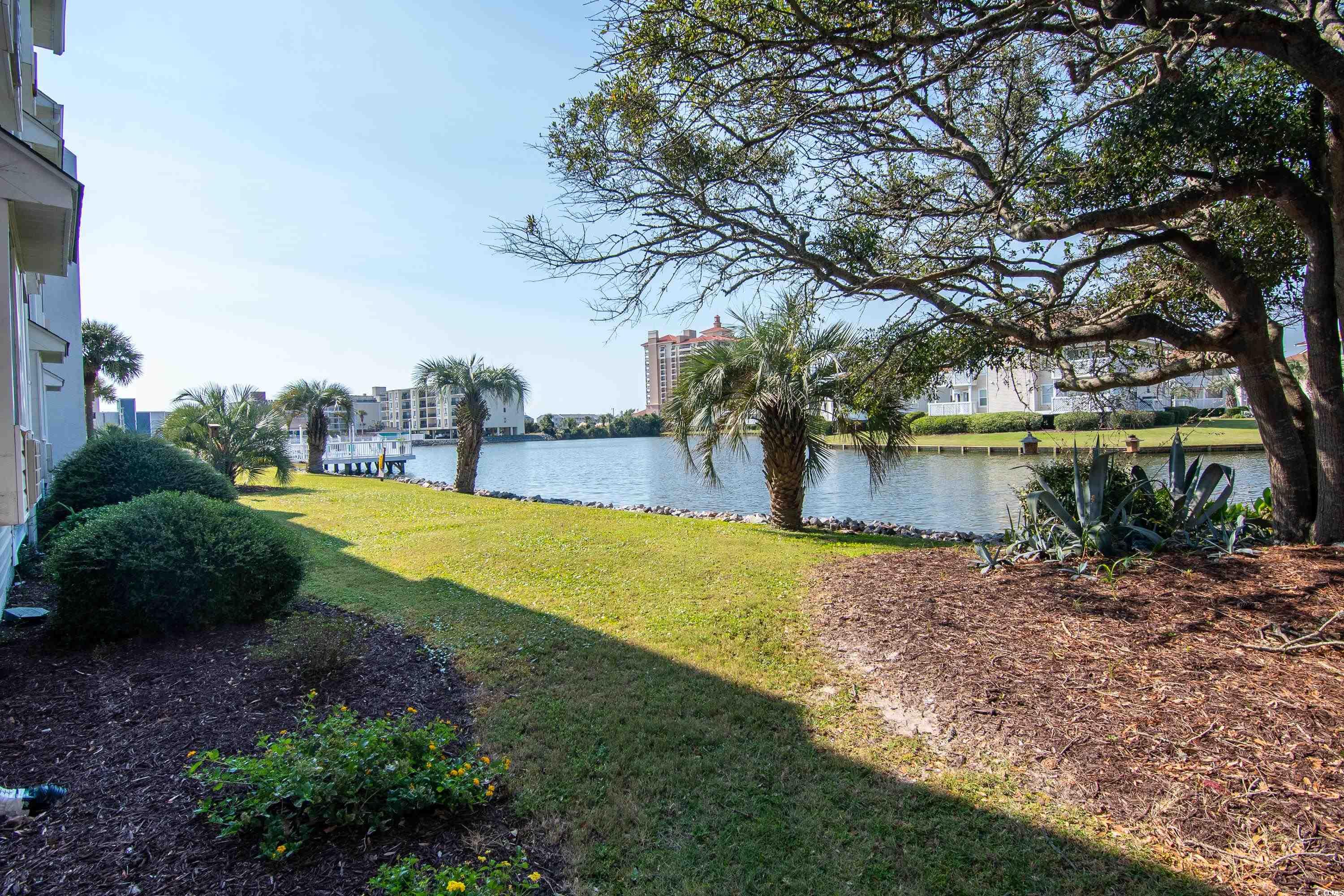 1919 Spring Street, Unit B16 North Myrtle Beach, SC 29582 - Photo 13 of 40 View of yard with a water view
