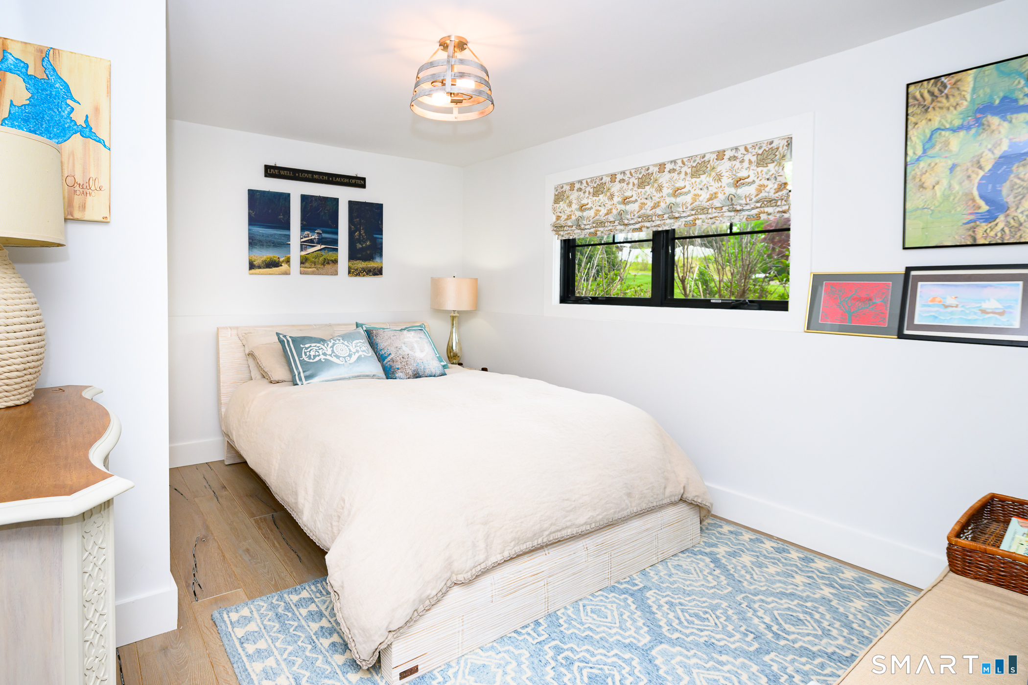 8 East Wharf Road Waterford, CT 06385 - Photo 25 of 40 a bedroom with a bed and a window