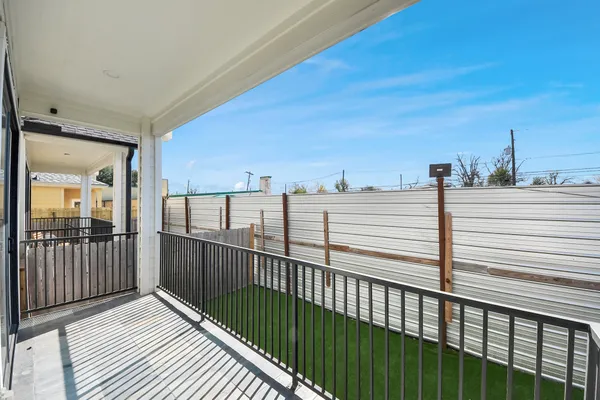 a bathroom with a tub sink double vanity and mirror