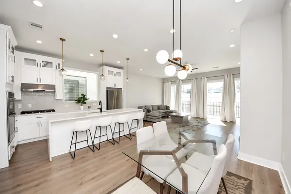 a bedroom with a bed and a ceiling fan